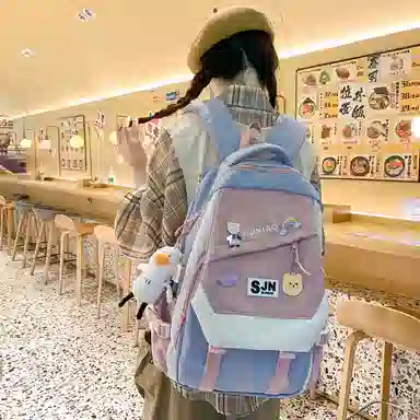 尼格尔大容量双肩背包休闲校园女生尼龙双肩包小学生初中生学生上课书包女多色