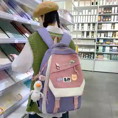 尼格尔大容量双肩背包休闲校园女生尼龙双肩包小学生初中生学生上课书包女多色