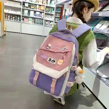 尼格尔大容量双肩背包休闲校园女生尼龙双肩包小学生初中生学生上课书包女多色