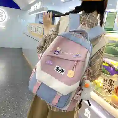 尼格尔大容量双肩背包休闲校园女生尼龙双肩包小学生初中生学生上课书包女多色