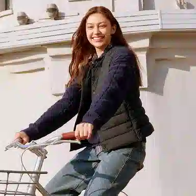 坦博尔 轻薄保暖修身纯色圆领百搭马甲羽绒服 女款