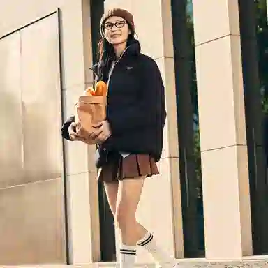 鸿星尔克 综训系列 三防保暖纯色简约宽松柔软轻盈舒适通勤出游百搭立领面包服羽绒服 女款 正黑