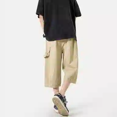 功夫熊猫 美式复古未来主义风手绘卡通动漫字母印花轻薄舒适透气凉感织带抽绳侧边排扣设计时尚宽松阔腿七分休闲短裤 男女同款