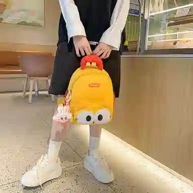 醇龙 卡通可爱 尼龙 双肩包 常规 男女同款情侣款 黑色，黄色，棕色，蓝色，紫色