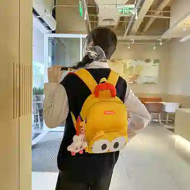 醇龙 卡通可爱 尼龙 双肩包 常规 男女同款情侣款 黑色，黄色，棕色，蓝色，紫色