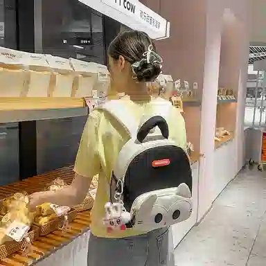 醇龙 卡通可爱 尼龙 双肩包 常规 男女同款情侣款 黑色，黄色，棕色，蓝色，紫色