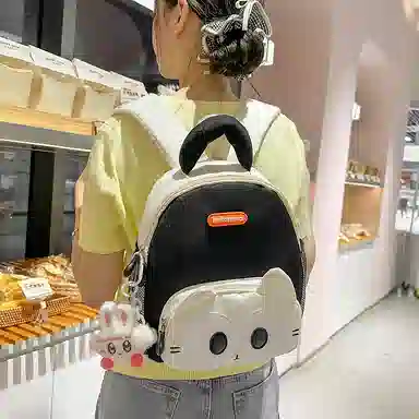 醇龙 卡通可爱 尼龙 双肩包 常规 男女同款情侣款 黑色，黄色，棕色，蓝色，紫色