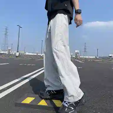 美式高街激光冲孔透气空调裤冰丝速干薄款垂感阔腿无性别抽绳工装伞兵休闲裤 男女同款 黑色