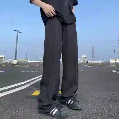 美式高街激光冲孔透气空调裤冰丝速干薄款垂感阔腿无性别抽绳工装伞兵休闲裤 男女同款 黑色