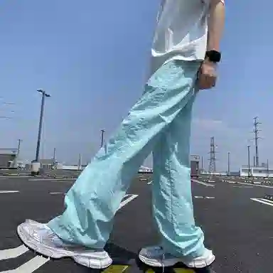 美式高街激光冲孔透气空调裤冰丝速干薄款垂感阔腿无性别抽绳工装伞兵休闲裤 男女同款 黑色