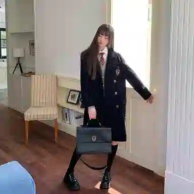 东鲸岁时记 毛呢学院风双排扣西装领长袖大衣 女款 黑色