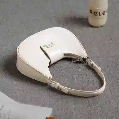 妙迪 小众设计高级感时尚气质通勤简约百搭 质感真皮牛皮 新月包月亮腋下包手提单肩斜挎包 中号 女款 黑色