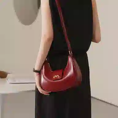 妙迪 小众设计高级感时尚气质通勤简约百搭 质感真皮牛皮 新月包月亮腋下包手提单肩斜挎包 中号 女款 黑色