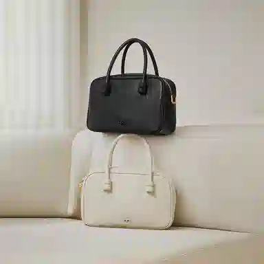 妙迪 小众设计时尚百搭精致少女上班通勤植鞣皮保龄球包学院风波士顿枕头包 牛皮 手提单肩斜挎包 常规 女款 奶昔白/曜石黑