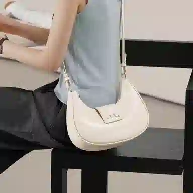 妙迪 小众设计高级感时尚气质通勤简约百搭 质感真皮牛皮 新月包月亮腋下包手提单肩斜挎包 中号 女款 黑色