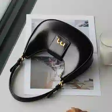 妙迪 小众设计高级感时尚气质通勤简约百搭 质感真皮牛皮 新月包月亮腋下包手提单肩斜挎包 中号 女款 黑色