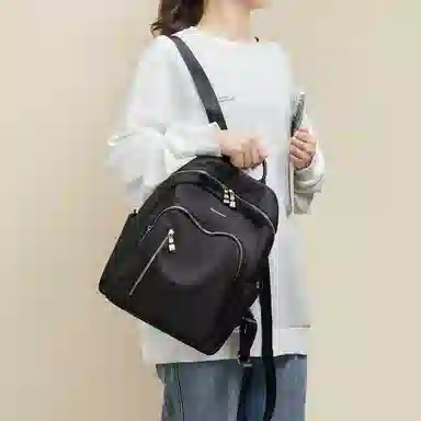 红蜻蜓 旅行背包大容量双肩包休闲女式双肩包 织物配超纤 女款 黑色