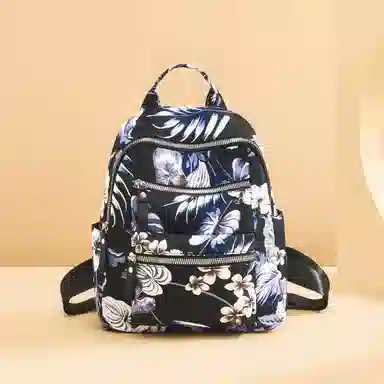 红蜻蜓 涂鸦印花大容量通勤出游书包 织物 背包双肩包 常规 男女同款情侣款 多色