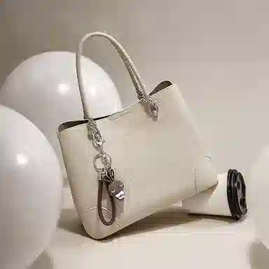 红蜻蜓 可爱挂件通勤百搭潮流时尚 牛皮 单肩手提包 男女同款情侣款 米白色