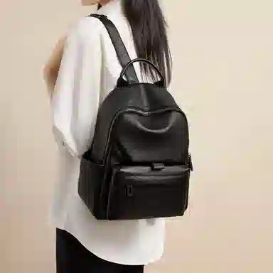 红蜻蜓 轻便通勤运动书包旅行旅游背包 牛皮 双肩包 常规 男女同款情侣款 黑色