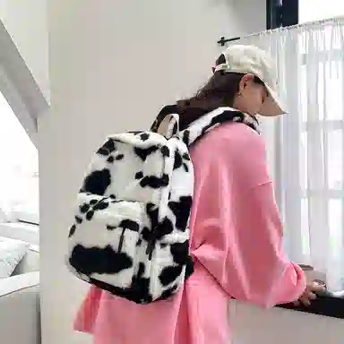 轩玺 韩系奶牛设计休闲简约百搭通勤 毛绒 双肩包 大号 男女同款情侣款 黑配白/豹纹
