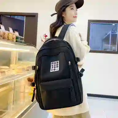 德力熊双肩包尼龙书包学生旅行背包男女通用多色大容量高中生百搭电脑双肩背包