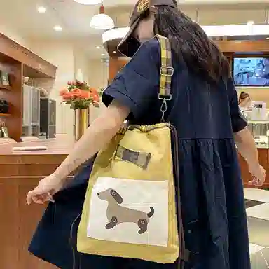彤彤兔 迷人布腊肠狗 尼龙 双肩包 男女同款情侣款 黄色