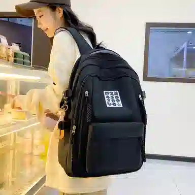 德力熊双肩包尼龙书包学生旅行背包男女通用多色大容量高中生百搭电脑双肩背包