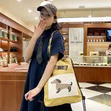 彤彤兔 迷人布腊肠狗 尼龙 双肩包 男女同款情侣款 黄色