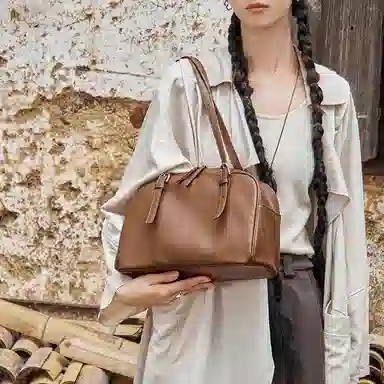 纳兰杜 小众品牌时尚保龄球包洋气百搭高级感通勤 牛皮 手提单肩包 大号 女款 植鞣黑色/植鞣棕色