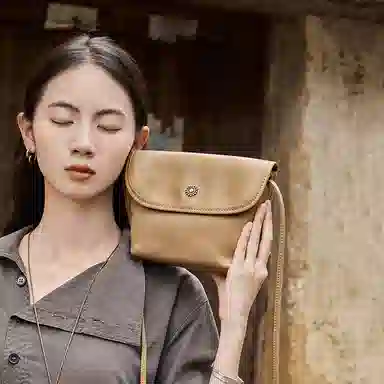 纳兰杜 复古简约休闲通勤简约百搭潮流水桶包 牛皮拼合成革 单肩斜挎包 迷你 女款 咖色/棕色