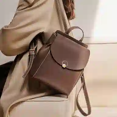 纳兰杜 大容量出行旅游高级感百搭高中生初中生轻便 牛皮拼合成革 背包双肩包 大号 女款 白拼咖色