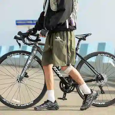 领航骆驼 美式速干透气纯色户外运动直筒休闲短裤 男女同款