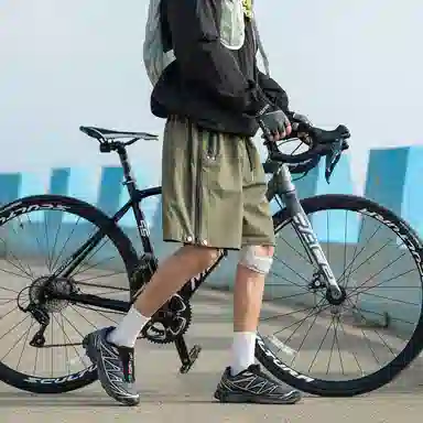 领航骆驼 美式速干透气纯色户外运动直筒休闲短裤 男女同款