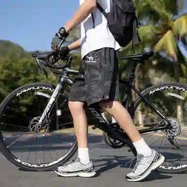 领航骆驼 美式速干透气纯色户外运动直筒休闲短裤 男女同款