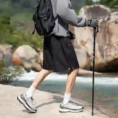 领航骆驼 美式速干透气纯色户外运动直筒休闲短裤 男女同款