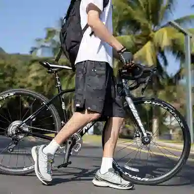 领航骆驼 美式速干透气纯色户外运动直筒休闲短裤 男女同款