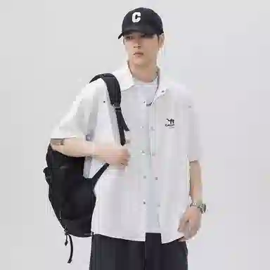 领航骆驼 嘻哈街头美式时尚翻领痞帅复古潮牌凉感透气薄款宽松休闲百搭轻商务通勤落肩短袖   衬衫  男女同款