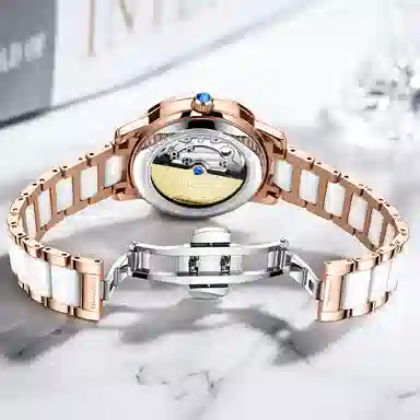 冠琴 绮梦星河系列 高颜值时尚潮流镶钻女士手表 自动机械机芯 牛皮表带 国表 女表 白色表盘 镂空飞轮夜光防水腕表