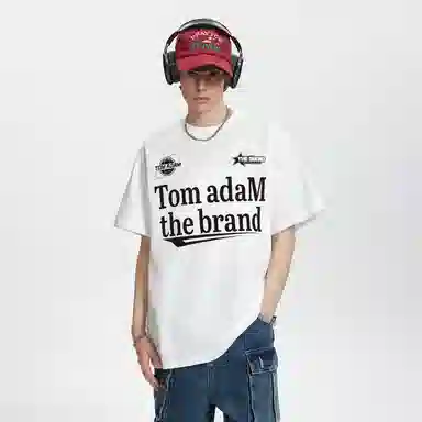 TOM ADAM T