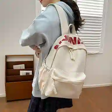 單倉 时尚简约字母大容量简约复古潮书包初高中学生轻便通勤旅行百搭 尼龙 双肩包 常规 男女同款情侣款 多色