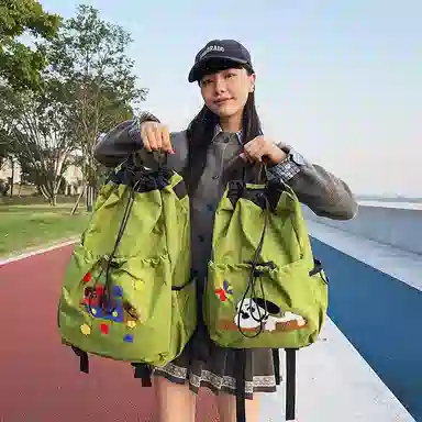 卡卡树 轻便休闲抽绳大容量通勤百搭 尼龙 双肩包 男女同款情侣款 黑色/黄色/卡其色/绿色