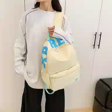 蔻蒂熊 潮流时尚包包小众简约少女书包高颜值女生旅行包高中大学生背包 尼龙布 双肩包 常规 青少年 白色/黄色/蓝色