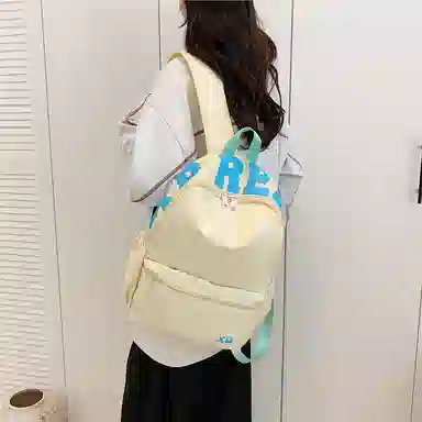 蔻蒂熊 潮流时尚包包小众简约少女书包高颜值女生旅行包高中大学生背包 尼龙布 双肩包 常规 青少年 白色/黄色/蓝色