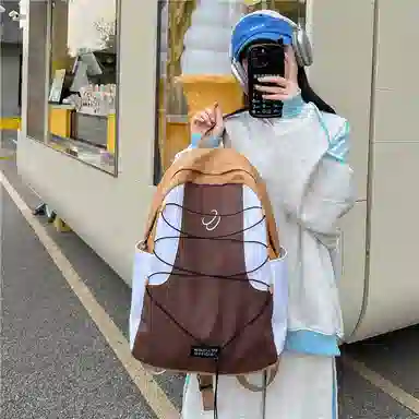 蔻蒂熊 书包百搭女小清新高颜值大容量个性设计拼色 涤纶 双肩包 常规 青少年 黑色/绿色/蓝色/棕色