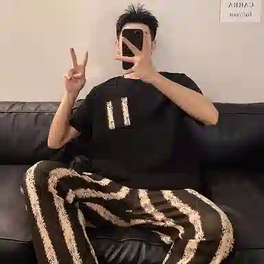 莫代尔 气质时尚宽松舒适圆领套头休闲轻盈透气百搭短袖长裤可外穿夏季睡衣套装 男款 黑色