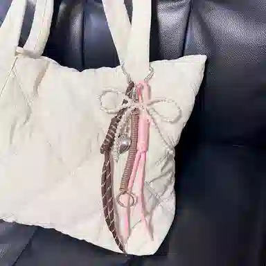 TBoML Bow Weave Charm