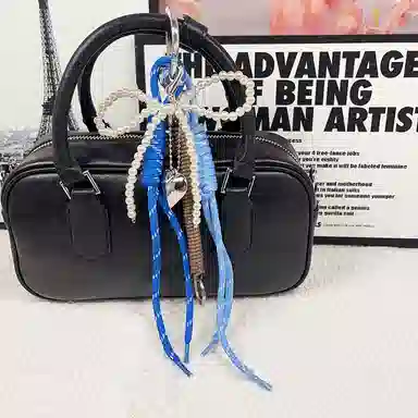 TBoML Bow Weave Charm