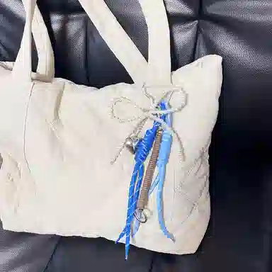 TBoML Bow Weave Charm