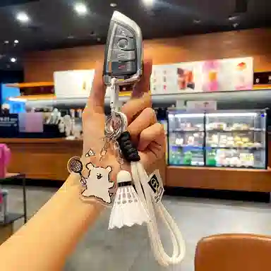 丹琴 卡通小狗爱打羽毛球趣味系列钥匙扣可爱仿真书包挂饰 亚克力/挂绳 挂件 男女同款情侣款